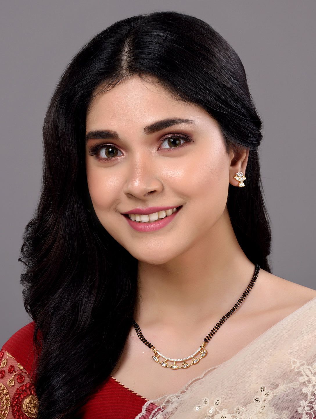 Gold Plated Black Beads AD Studded Mangalsutra Pendant Earrings Set