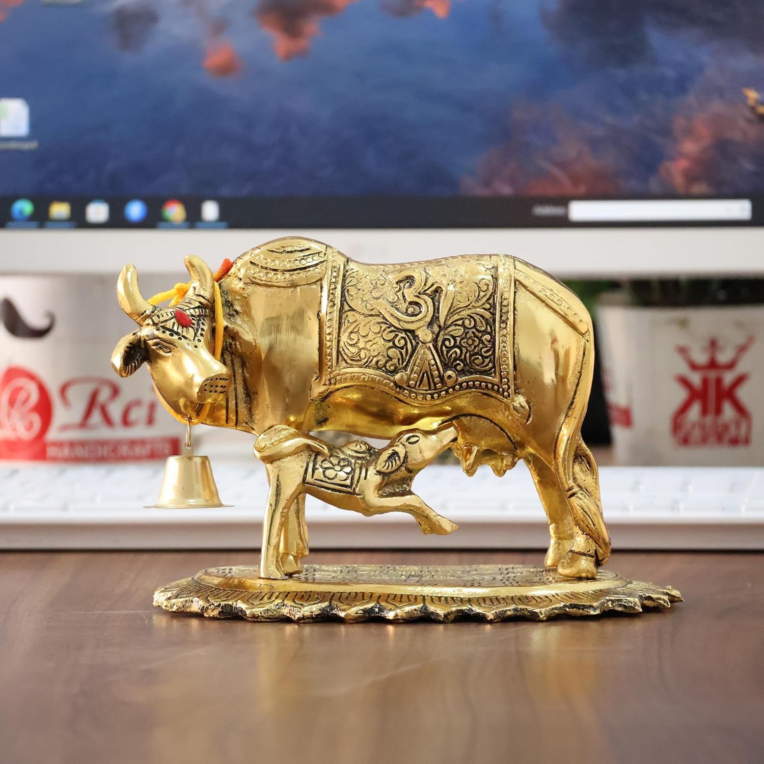 Dreamkraft Metal Om Kamdhenu Cow and Calf Statue Idol for Home Temple, Office & Tabletop Decoration Golden 12.5 cm Height