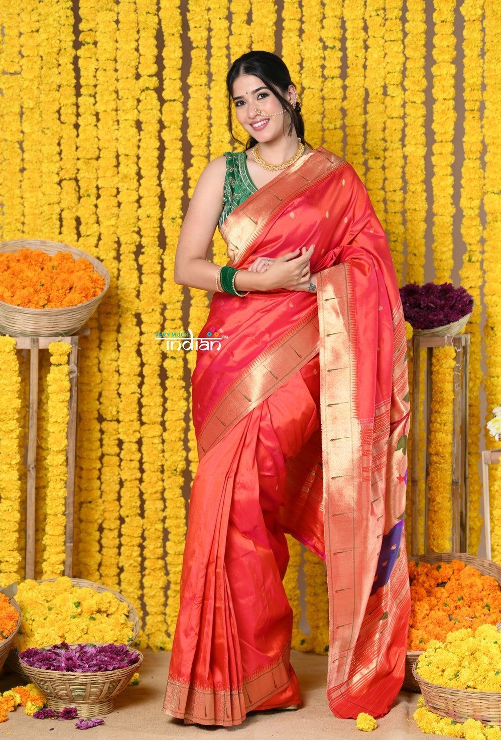 Rajsi~ Handloom Pure Silk Muniya Border Saree with Handcrafted Peacock Pallu in Peach Red