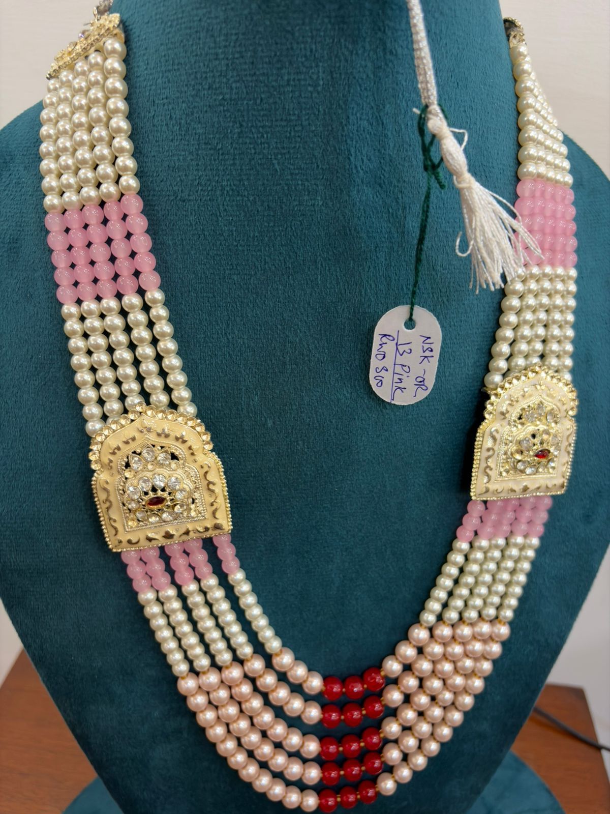 premium pastel pink and off-white moti haar groom sherwani necklace with royal gold panels