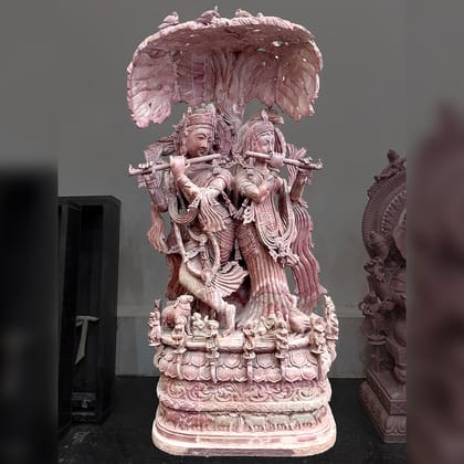 Radha Krishna with flute Pink Stone Statue Radha Krishna with flute Pink Stone Statue