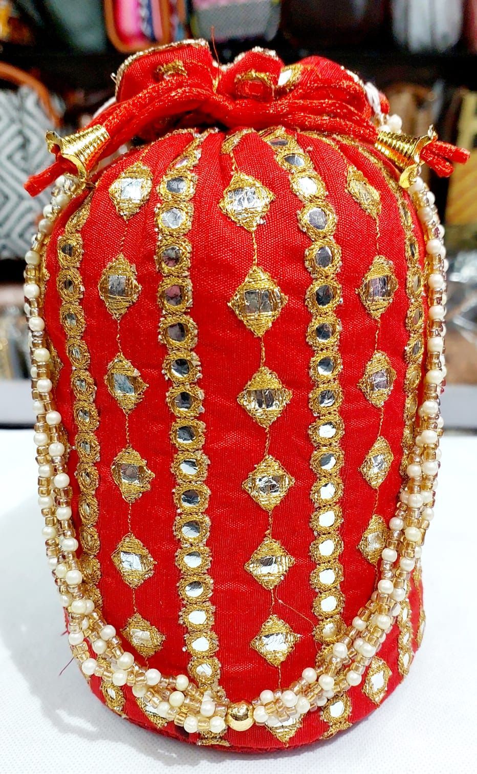 Embroidered Red and Gold Potli Bag with Pearl Beads