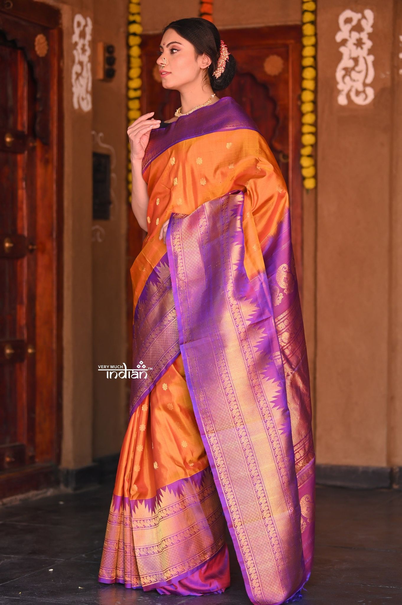 Raaga~ Traditional Handloom Pure Silk Orange Gold Gadwal with Purple Border and Pallu.