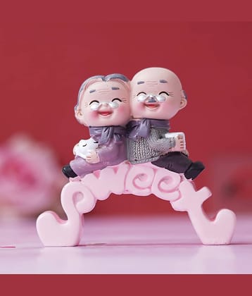 eCraftIndia Multicolor Resin Couple Figurine