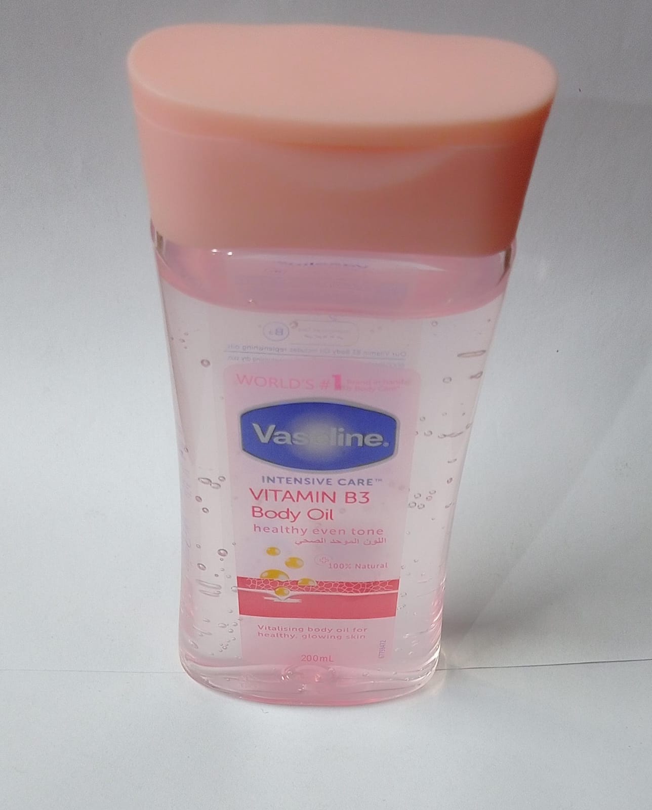 Nourishing Glow Vaseline Intensive Care Vitamin B3 Body Oil – Healthy, Even Tone for Glowing Skin