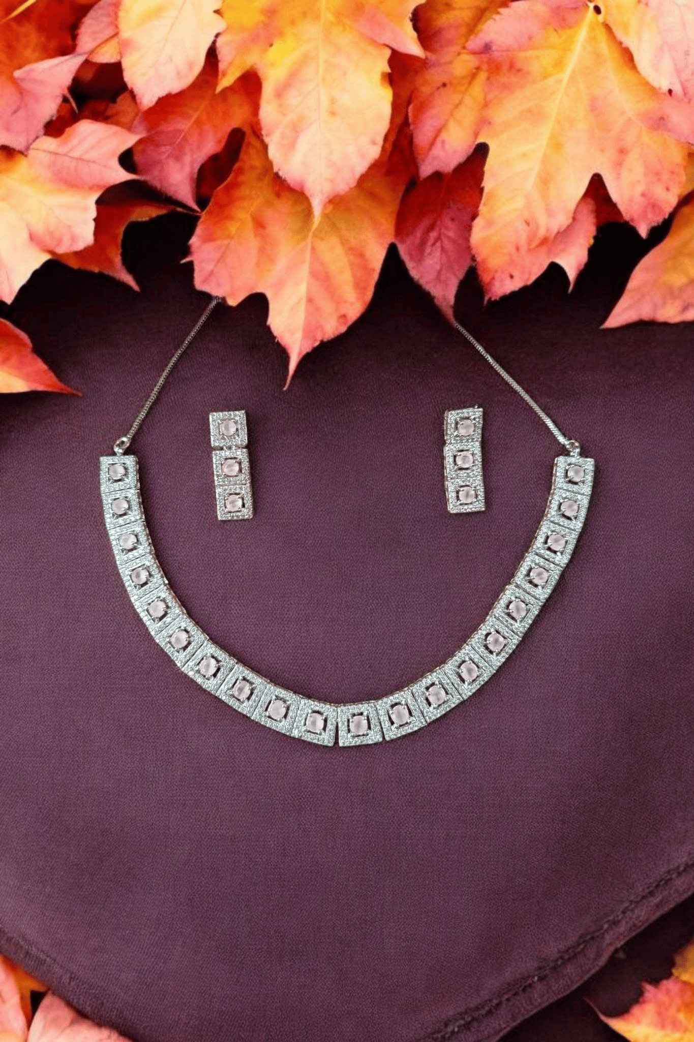 Elegant and Stylish Silver Necklace Set with Pink Stones