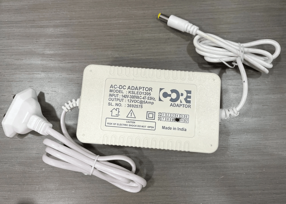 AC-DC Adaptor 12V DC@5Amp   140V-300VAC 47-53Hz  - KSLED1205 ( Suitable for  electronic devices  DC LED strip lights,CCTV security camera DVR NVR, RO,Modems, Piano,etc