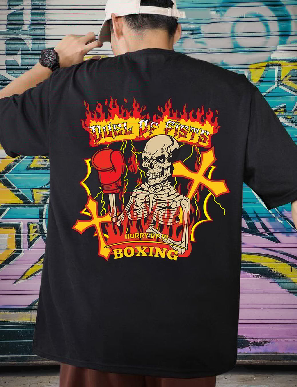 SCOTT FINCHER Men's Black T-Shirt with a Graphic of a Skeleton Wearing Boxing Gloves and the Words "Duel of Fists" and "Hurry Up" : AA(ARN)BLACK_238