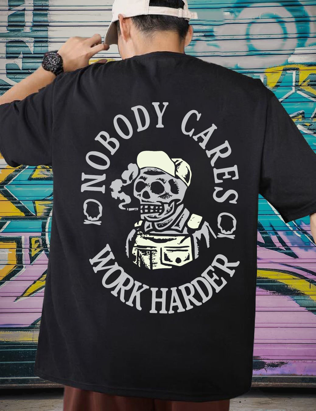 SCOTT FINCHER Men's Black cotton t-shirt with a white and red print of a skull in a hat and overalls smoking a cigarette with the text "Nobody cares, work harder" in a circle around it : AA(ARN)BLACK_271