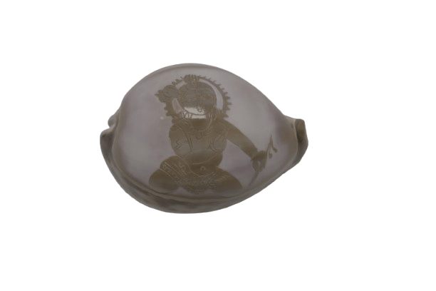 Intricately Carved Seashell with Deity Depiction