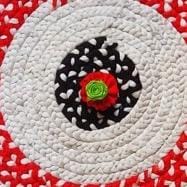 Handmade Circular Mat with Vibrant Color Pattern