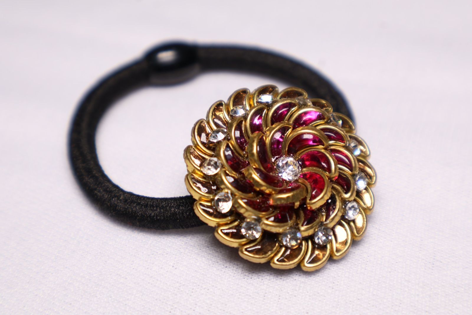Golden Floral Hair Tie with Red & White Stones – Stylish Elastic Band