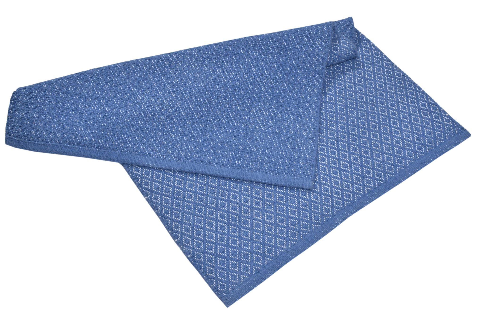 Pona Most cotton durries are reversible, offering dual-use designs.