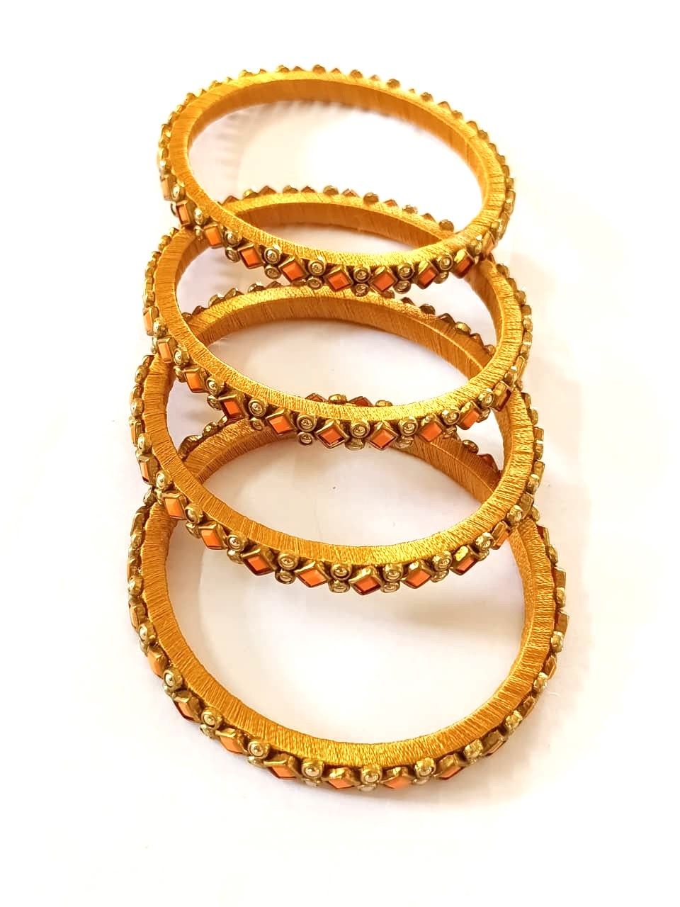 Handcrafted Golden Silk Thread Bangles | Orange Stone Embellished Ethnic Set