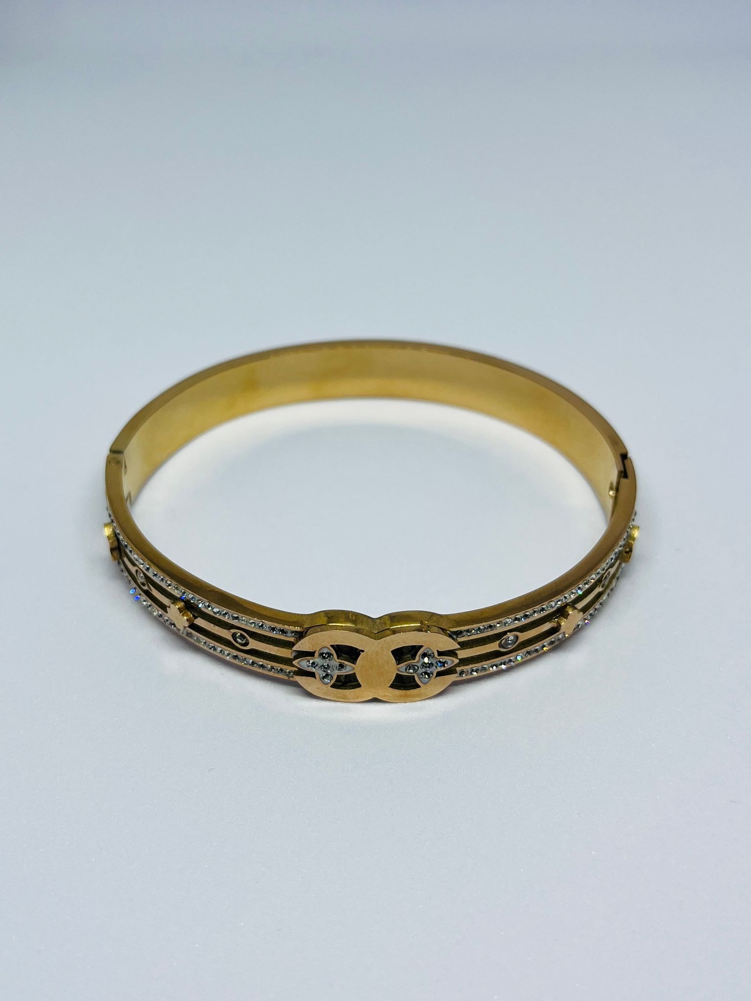 Elegant Gold-Plated Crystal Embellished Interlocking Bangle Bracelet for Women