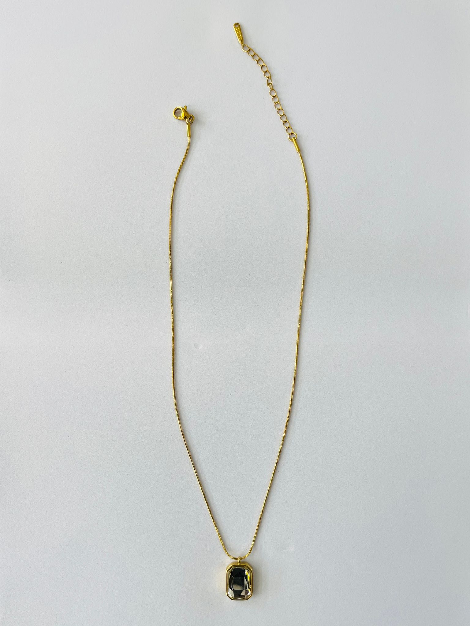 Gold-Toned Chain Necklace with Rectangular Clear Crystal Pendant