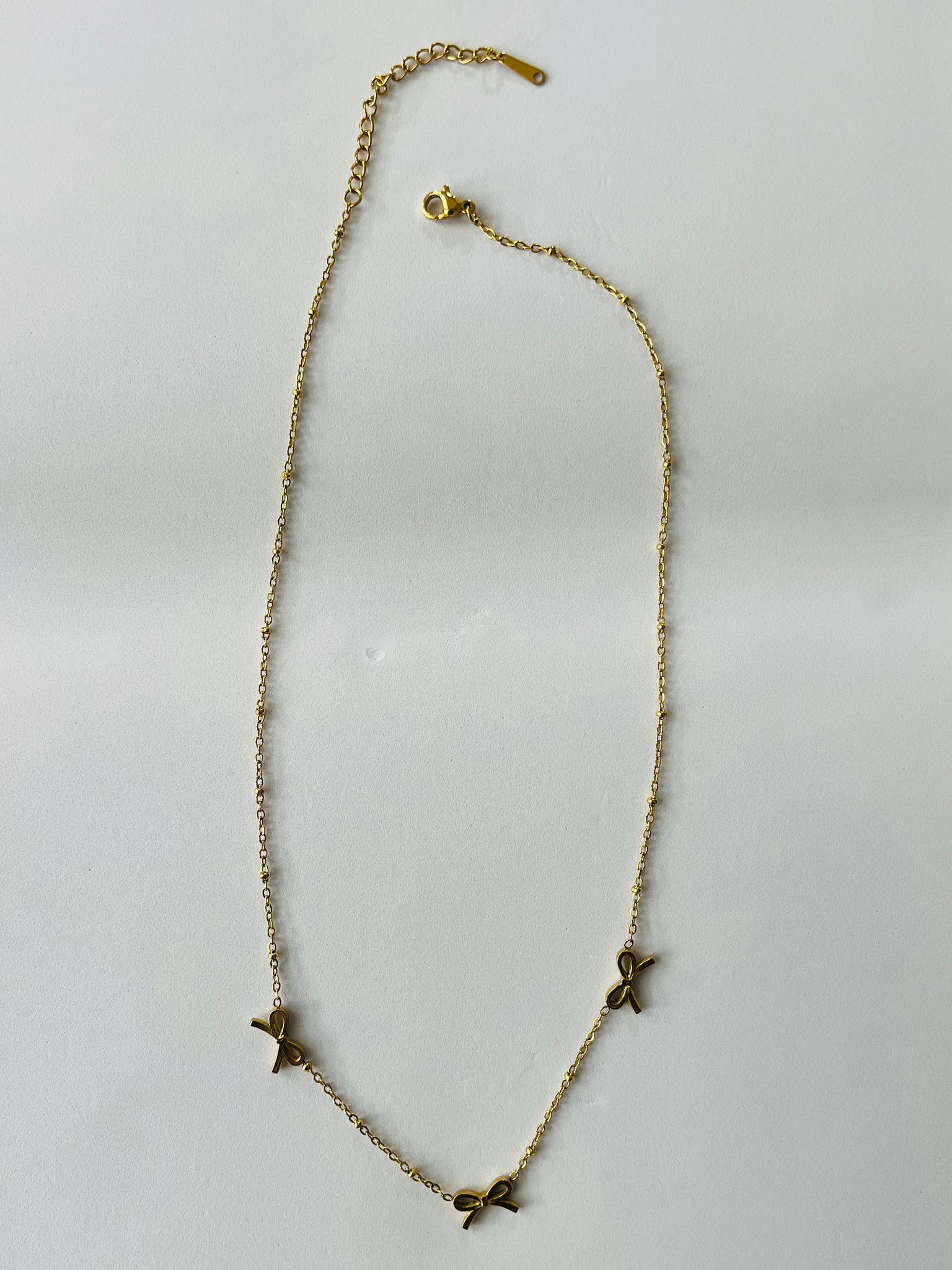 Elegant Gold-Plated Bow Charm Dainty Necklace