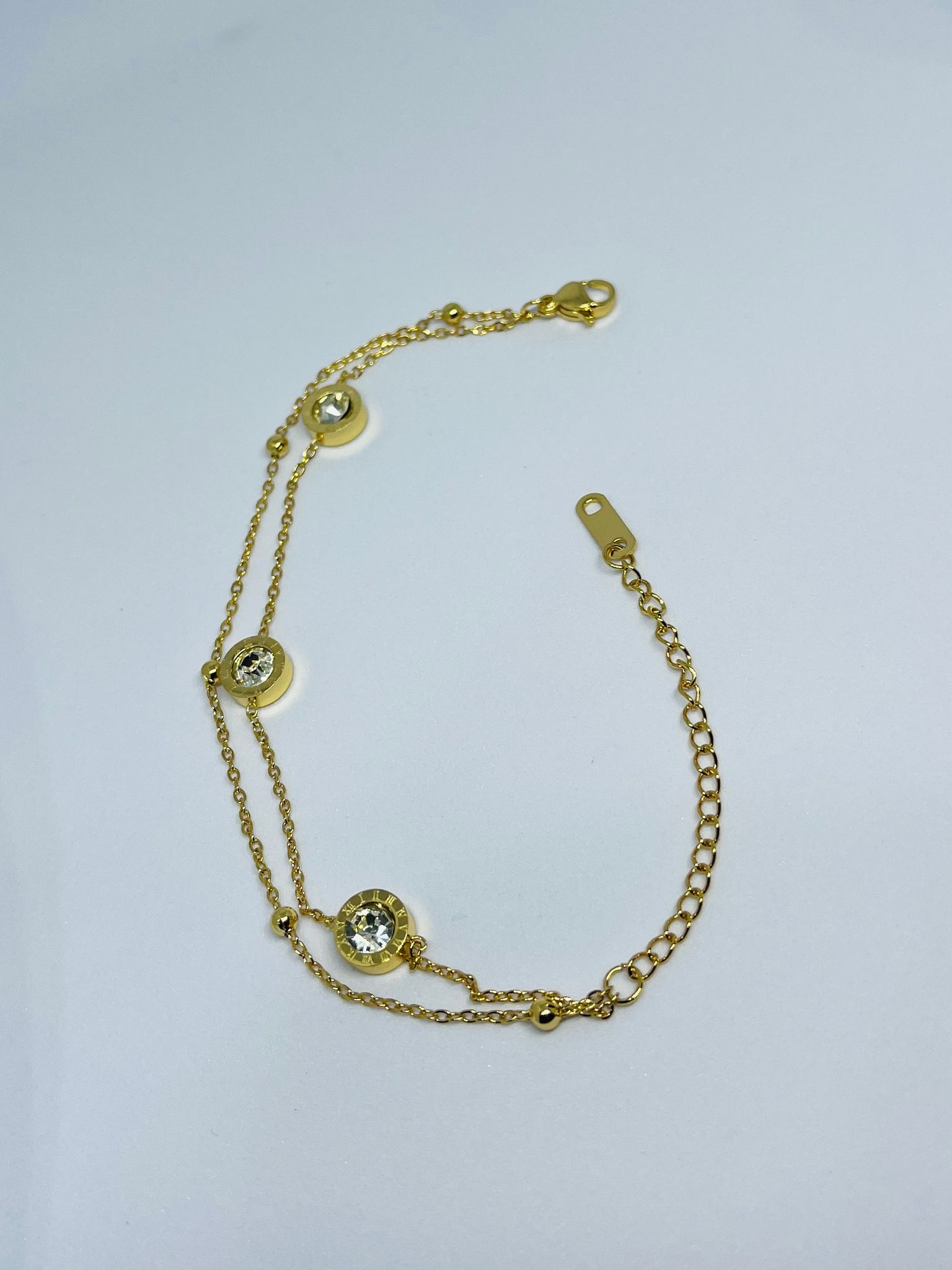 Elegant Gold Plated Dual Chain Bracelet with Crystal Charms