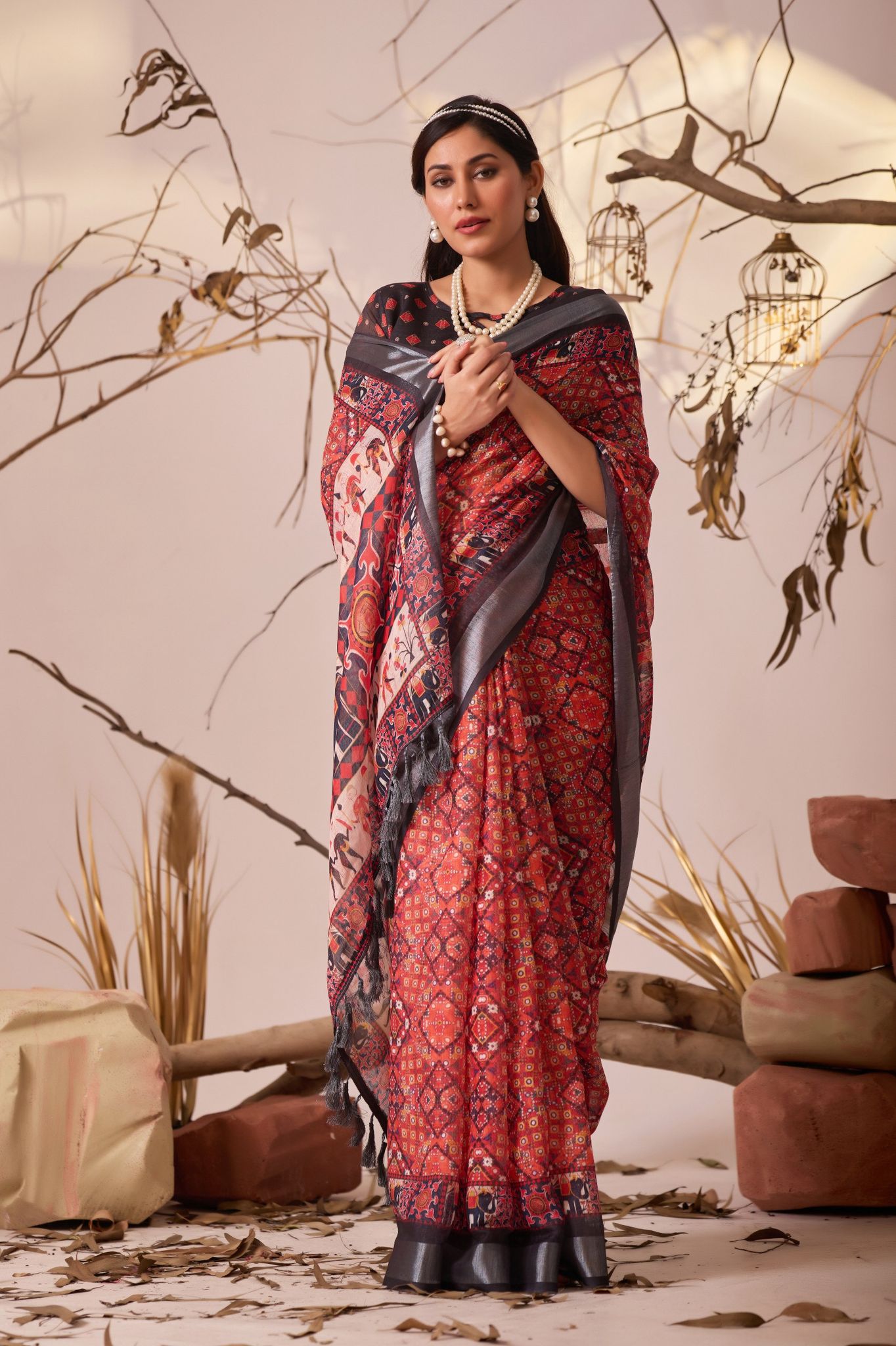 Elegant Red Printed Saree with Traditional Motifs