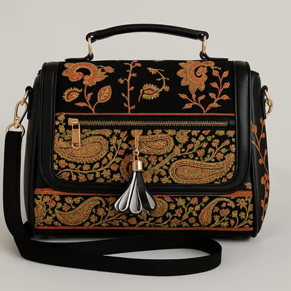 Elegant Black Handbag with Golden Accents & Patterned Sides