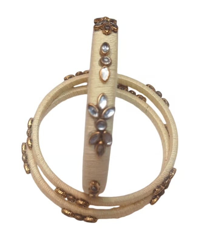 Elegant Cream Silk Thread Bangles with Kundan Stone Embellishments