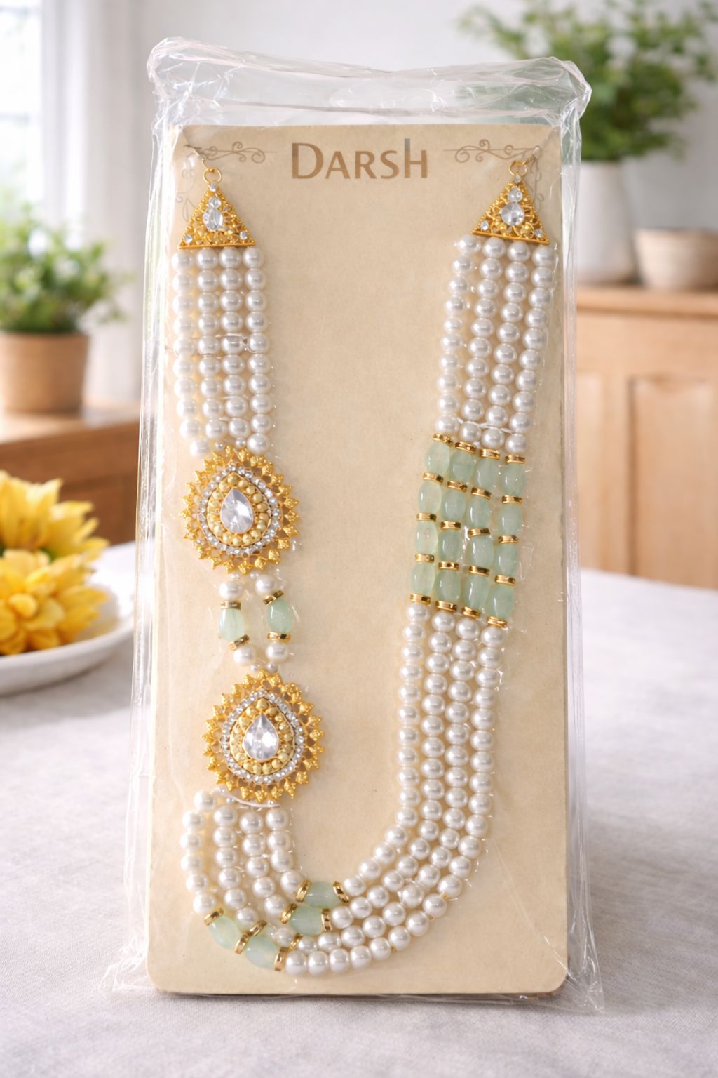 Elegant Multi-Strand Pearl Necklace with Green Accents & Gold-Plated Medallions