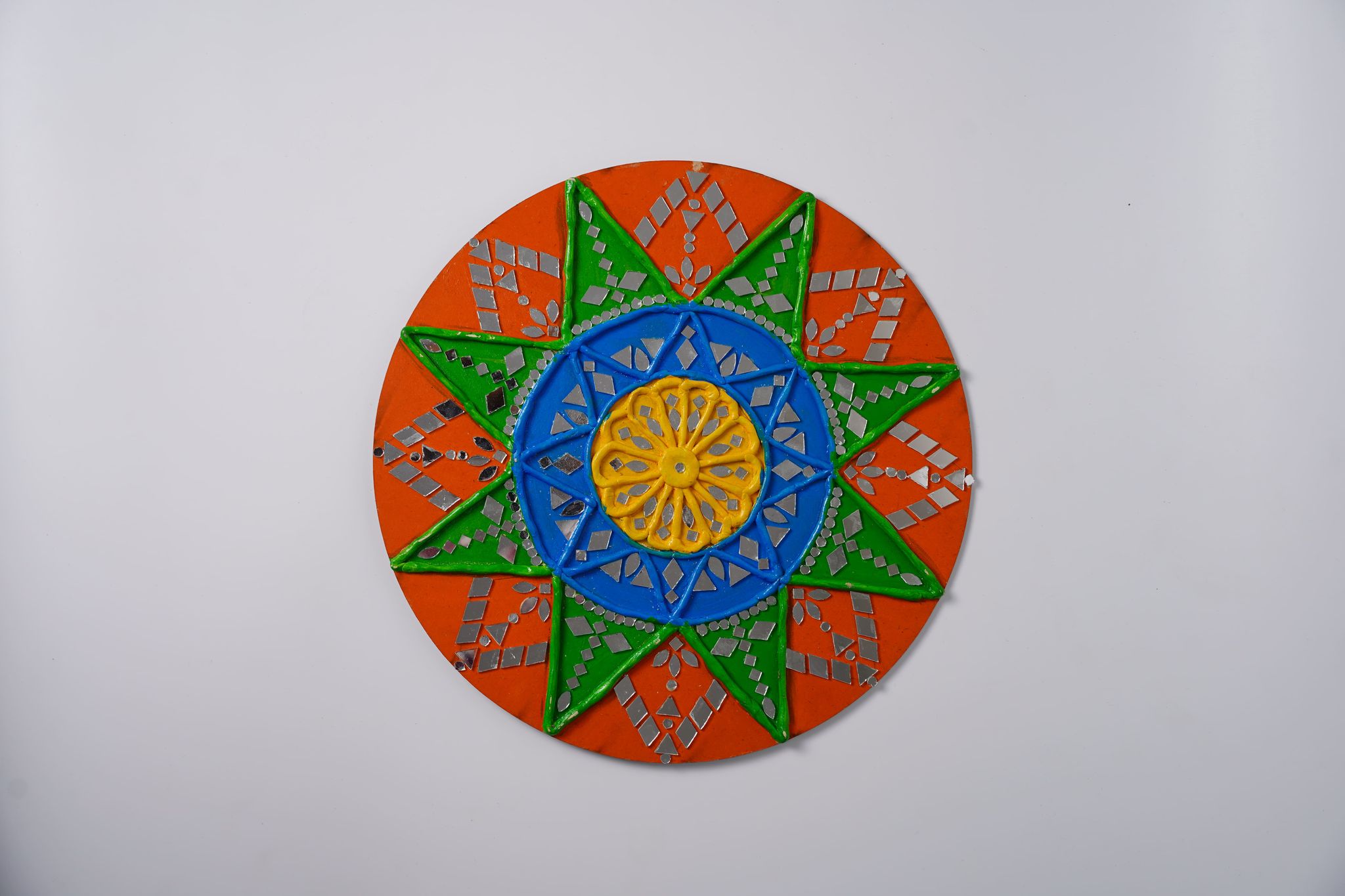 Lippan art, also known as mud and mirror work, which is a traditional mural craft
