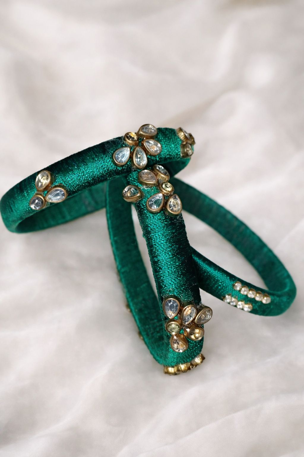 Emerald Green Thread Work Bangles with Kundan Stone Embellishments