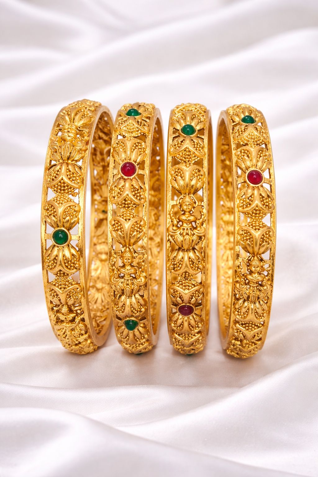 Elegant Floral Stone Studded Gold Bangles Set