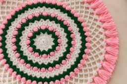 Hand-Crocheted Floral Placemat in Pink, Green, and White - 30cm Hand-Crocheted Floral Placemat in Pink, Green, and White - 30cm