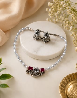 Heritage Elegance Pearl & Ruby Oxidized Silver Ghungroo Choker Set Heritage Elegance Pearl & Ruby Oxidized Silver Ghungroo Choker Set