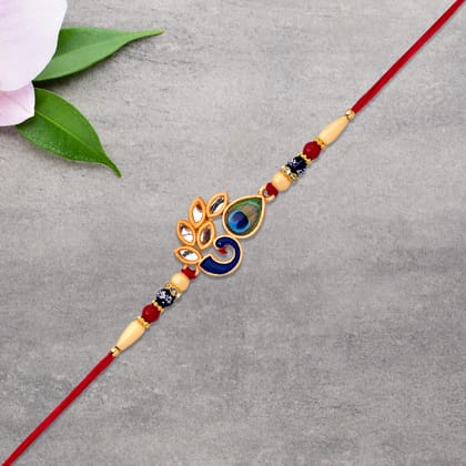 DHRUVINSRI Handcrafted Artistic Mor Pankh Rakhi With Colorful Enamel And Traditional Thread-1 Pc DHRUVINSRI Handcrafted Artistic Mor Pankh Rakhi With Colorful Enamel And Traditional Thread-1 Pc