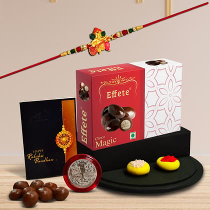 DHRUVINSRI Multicolor Idol ganesh rakhi  & Effete Chocolate Butter Scotch 32gm, with Silver Color Pooja Coin, Roli Chawal & Greeting Card, Occasion, Rakhi Combo gift pack, Rakhi & Chocolate for brother, rakhi with gift, -1  Combo Pack