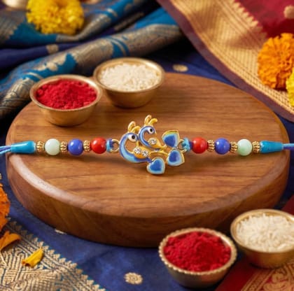DHRUVINSRI 4p Elegant Twin Morpankh Feather Rakhi Tilak Set Combo - 1 Designer Rakhi, 1 Laxmi Ganesha Coin, 2Pcs Tilak Pouches