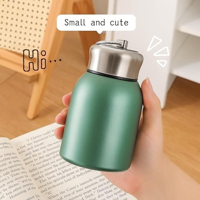 COMPACT STAINLESS STEEL MINI BOTTLE WITH CARRYING RING FOR CONVENIENT ON THE GO HYDRATION