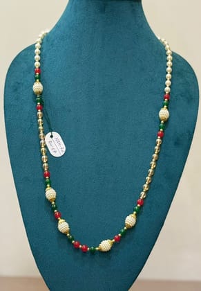 elegant dulha haar featuring white moti balls with red and green accents