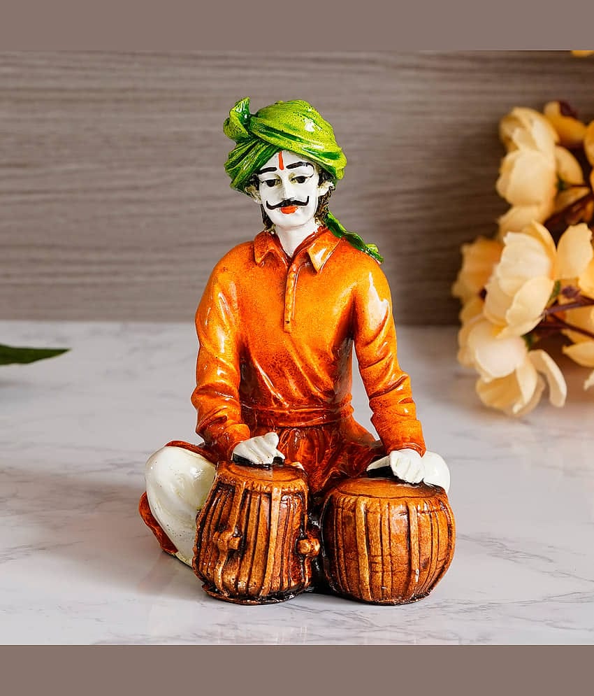 eCraftIndia Orange & Green Handcrafted Rajasthani Man Playing Tabla Polyresin Showpiece