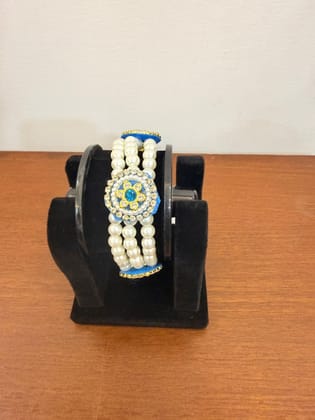 stretchable blue floral moti pear bracelet with crystal details
