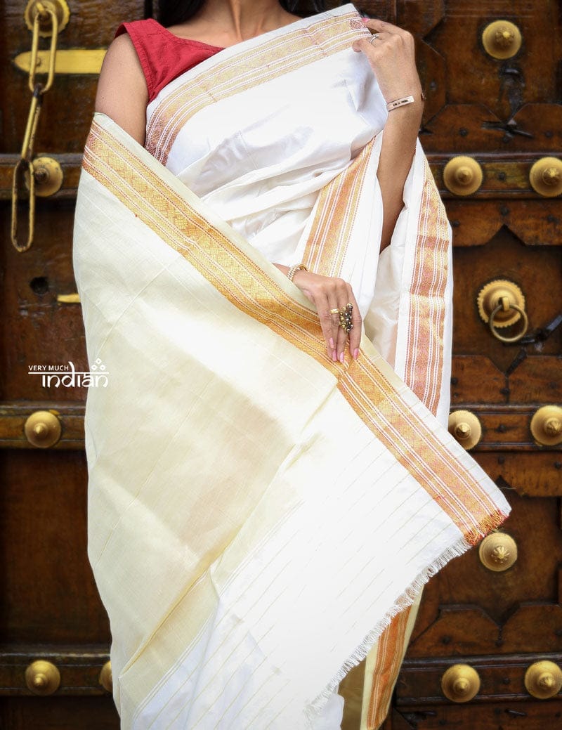 Utsaav ~ Traditional Handloom Pure Silk Jijamata Paithani in White and Gold