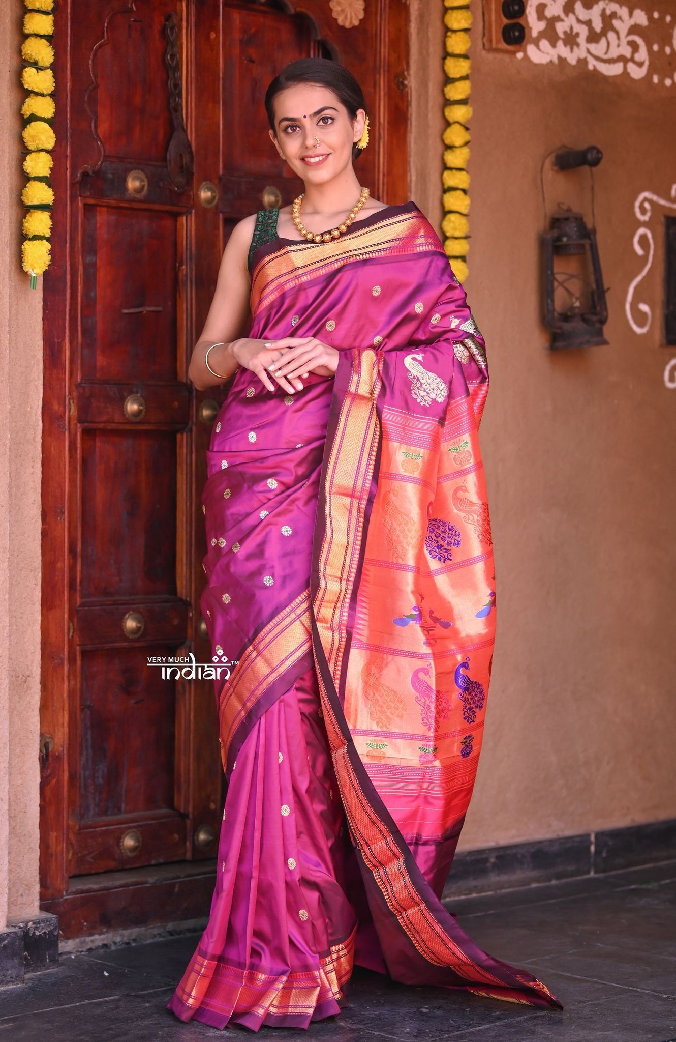 Raaga Traditional Handloom Pure Silk Wine Paithani with Meenawork Buttis and Grand Peacocks Pallu