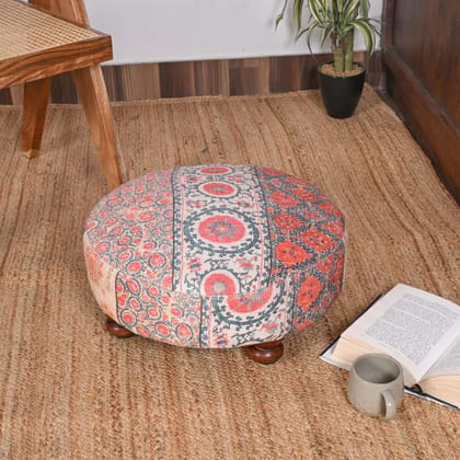 Vintage-Inspired Round Ottoman with Intricate Floral Design Vintage-Inspired Round Ottoman with Intricate Floral Design