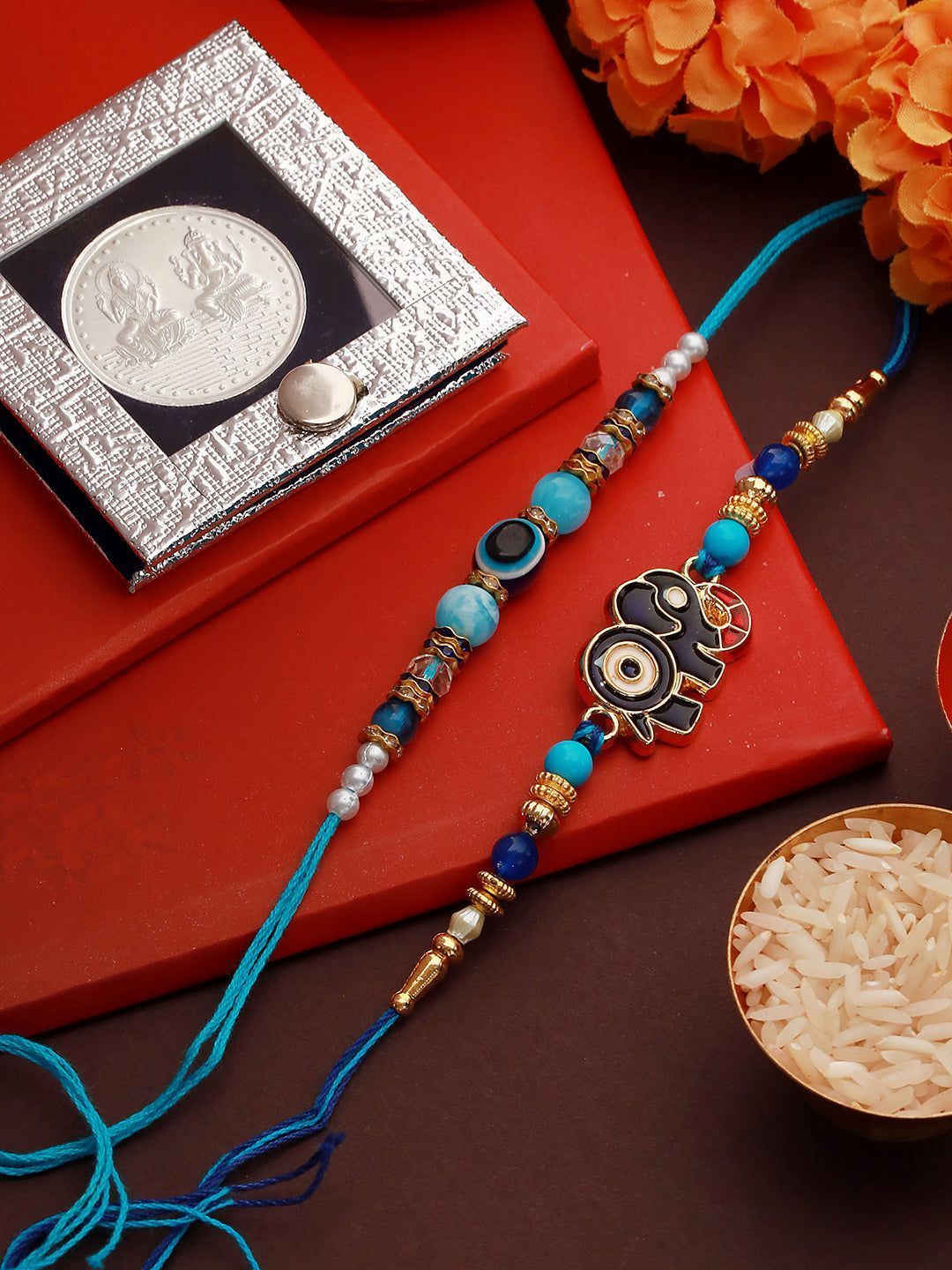 Set Of 2 Evil Eye Designer Rakhi with 10 gram Laxmi Ganesh round 999 Round Silver Coin