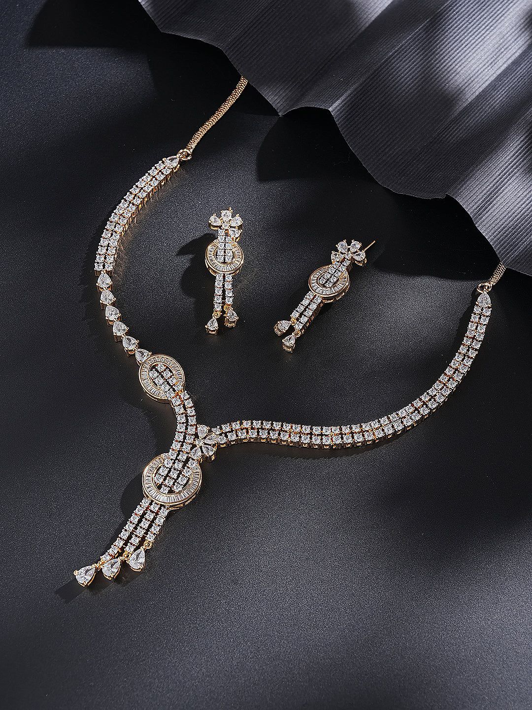 Gold Toned White AD Zircon Knotted Statement Pendant Jewellery Set