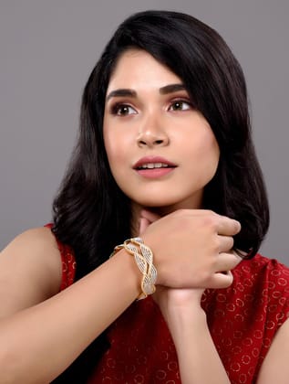 A Pair Of 2 Gold Dual  Toned AD Studded hand Crafted Bangles