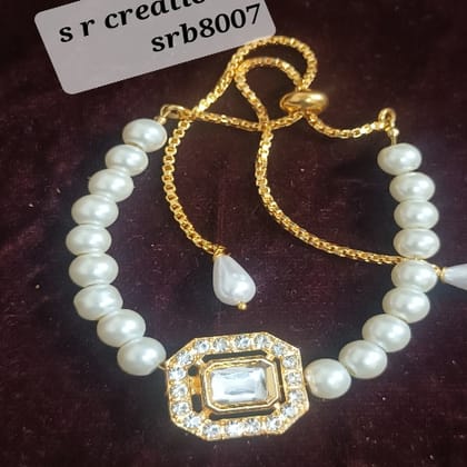 Kundan bracelet with ring