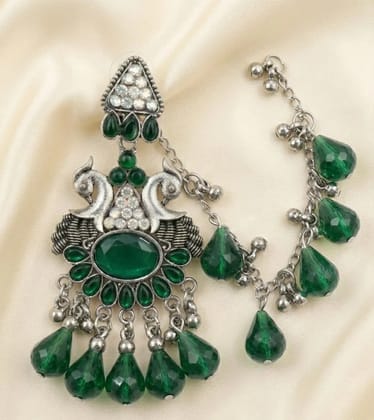 Vardaan Crystalx Exquisite oxidized silver Sahara earring featuring vibrant green crystals and intricate detailing, perfect for every women. Vardaan Crystalx Exquisite oxidized silver Sahara earring featuring vibrant green crystals and intricate detailing, perfect for every women.