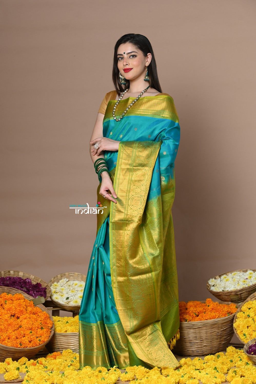 Rajsi~ Handloom Pure Silk Gadwal Saree Handcrafted Zari Pallu In Blue and Green Border