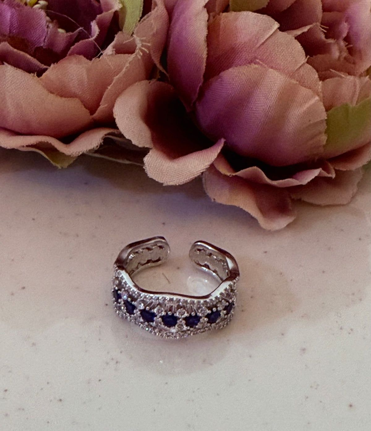 Smitam Jewels Waves of Elegance Ring Sapphire Blue Colour Crystal Wave Design Brass Ring