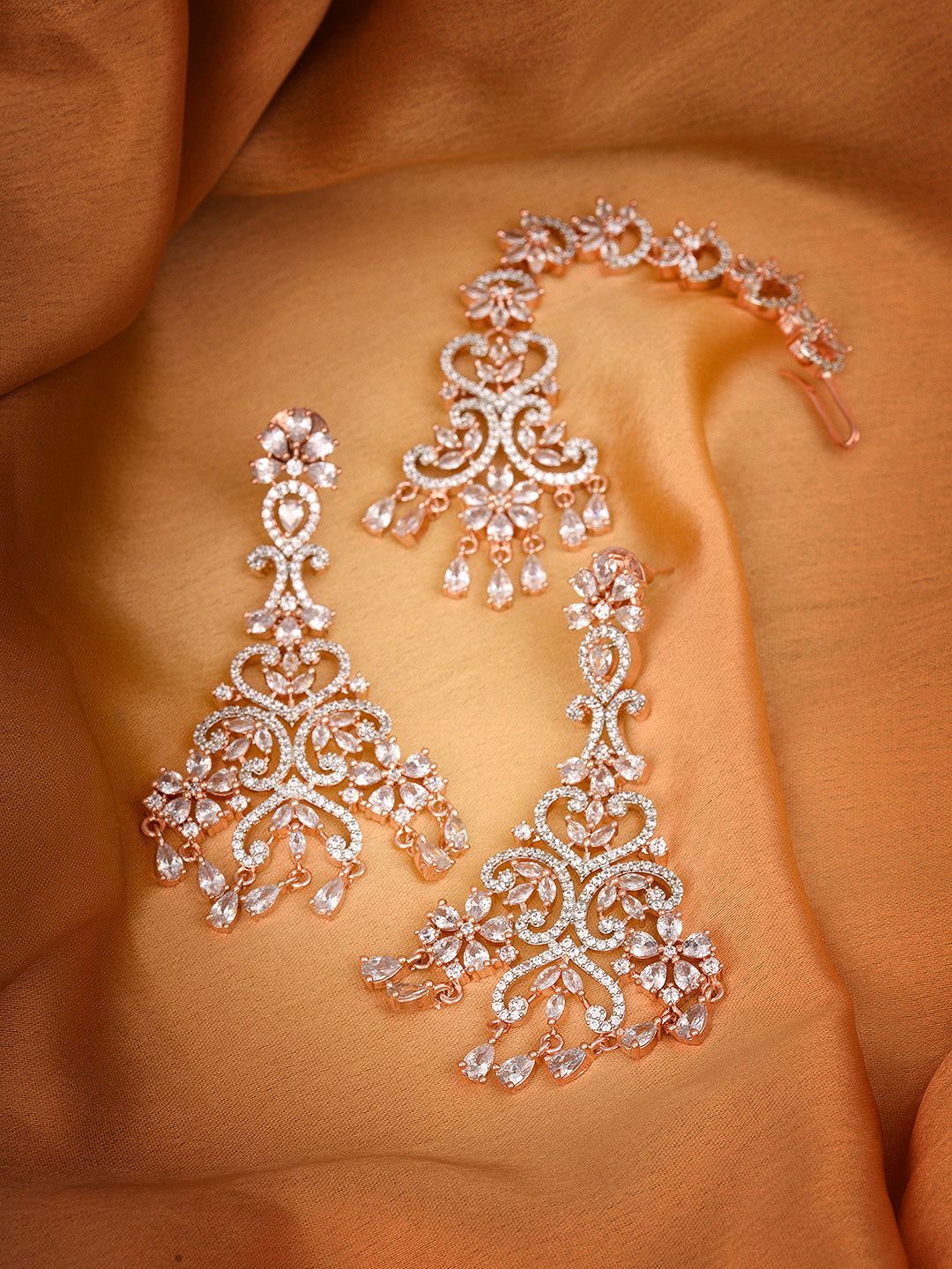 Rose Gold plated AD studded flower Design Mangtika & Earring set