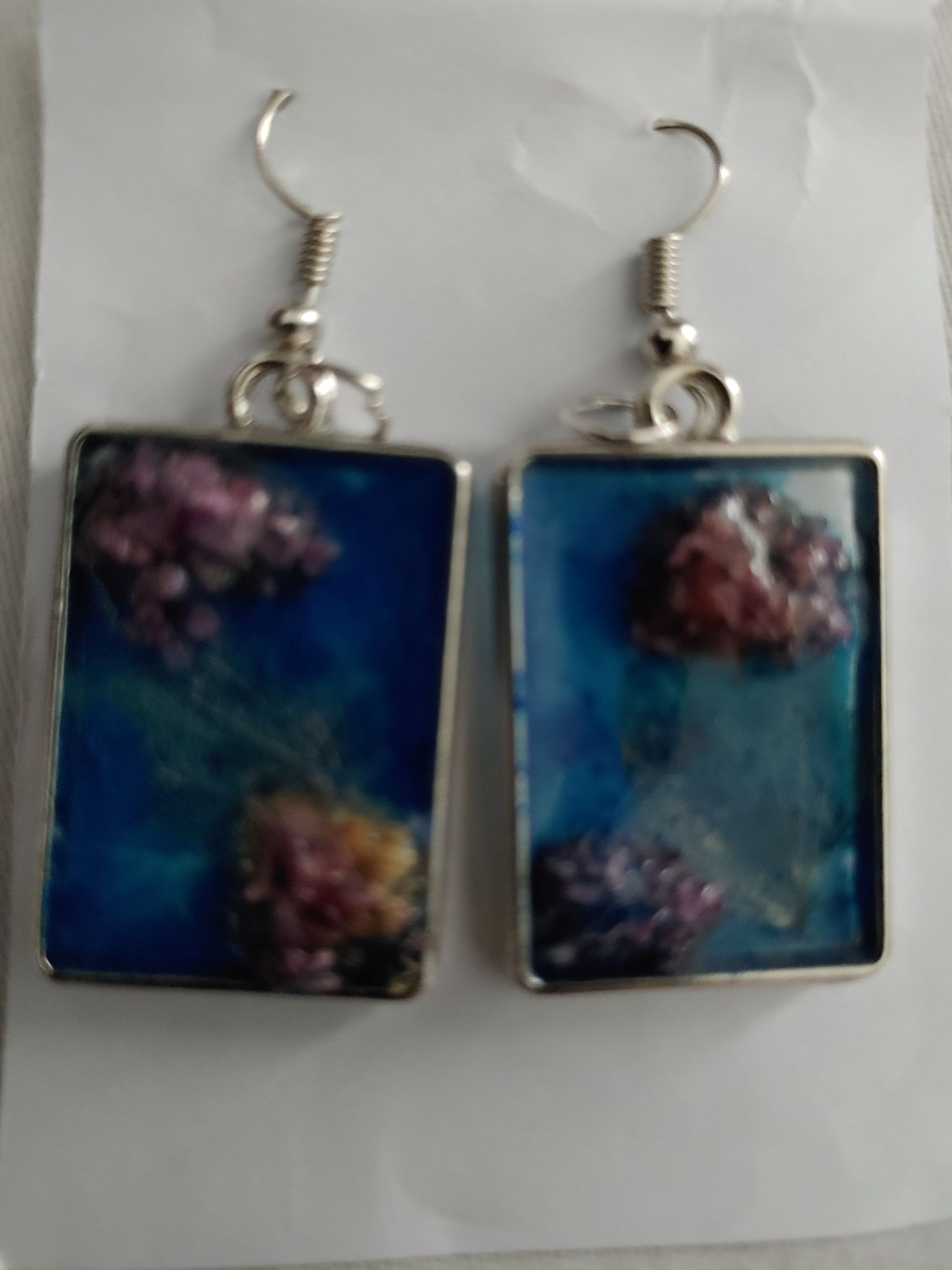 Resin blue colour earrings with flower